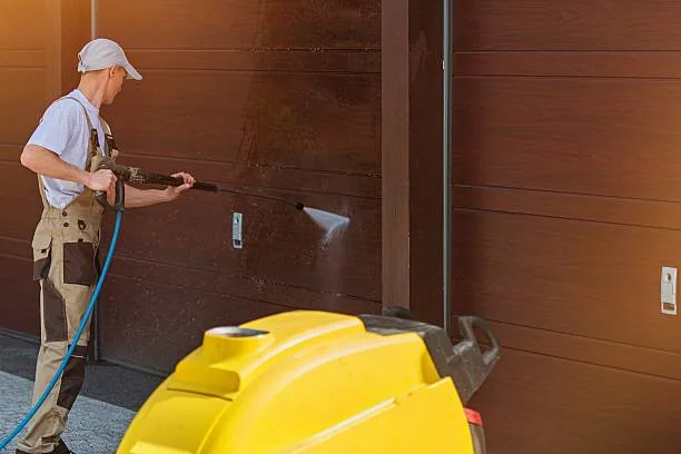 Why Routine Garage Door Cleaning Protects Your Investment